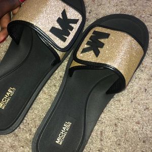 Micheal Kor slides